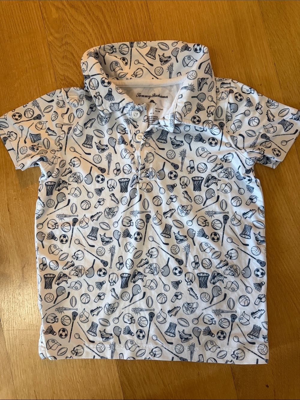 Tommy Bahama White Polo with Navy Sports Icon Print